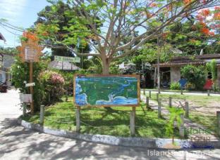 Chegada de Boipeba, jardim com mapa da ilha de boipeba